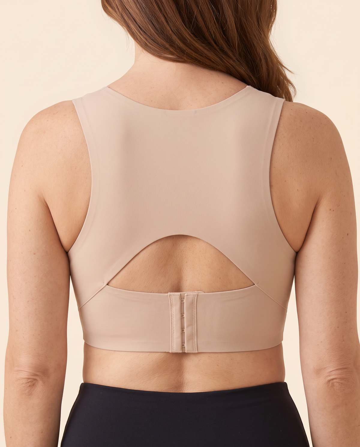 Close-up of the X-back panel and cut-out, nude